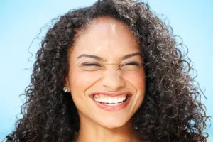 Professional teeth whitening treatment showing before and after results