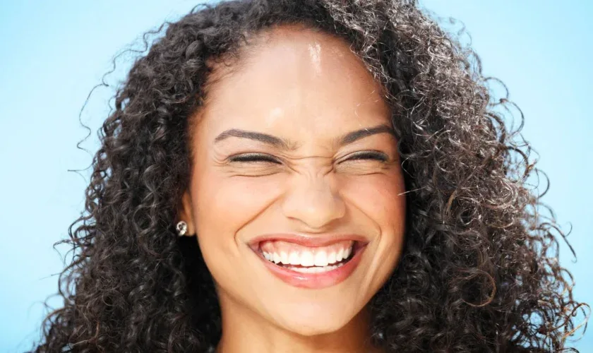 Professional teeth whitening treatment showing before and after results